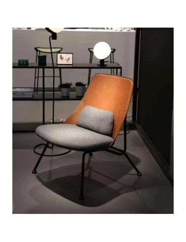 Contemporary design low armchair in gray leather and fabric strain prostoria