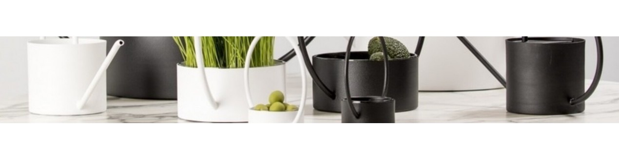 Discover our design metal vases from major European brands: XL Boom, Dôme deco